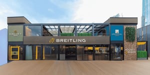 Front view of Breitling’s luxurious two-storey exhibition stand at Dubai Watch Week.