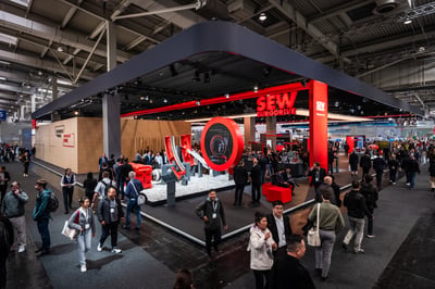 The SEW-EURODRIVE stand was a huge hit, featuring a prominent logo in bright red that stood out above the crowd.