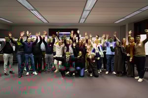 Group photo of a diverse group of employees at ET GLOBAL.