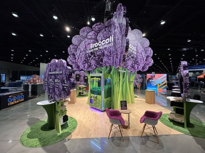Broccoli AI’s exhibition stand, featuring a large stylised broccoli structure in the centre of the stand.